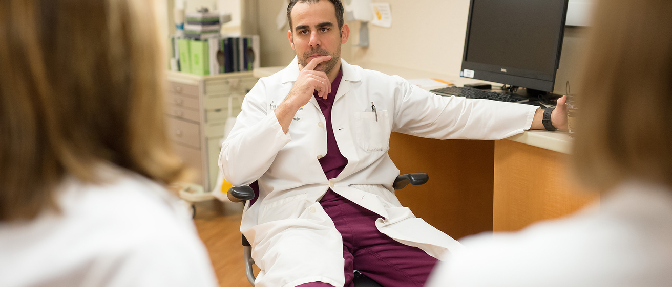 Faculty Luis Garcia with residents