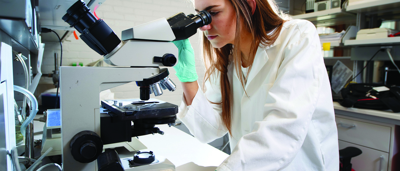 ICTS woman with microscope