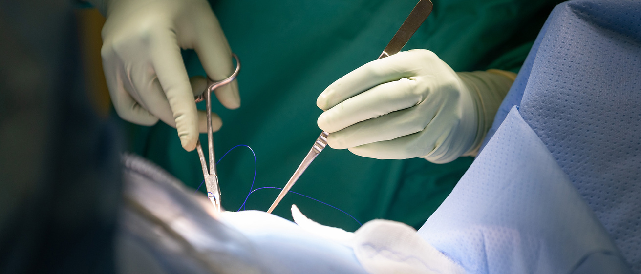 Surgery close up on surgeon hands